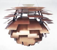 1958 - Artichoke Hanging Lamp Poul Henningsen - Denmark Combines simple curved geometric forms in concentric and inverted arrangements to...