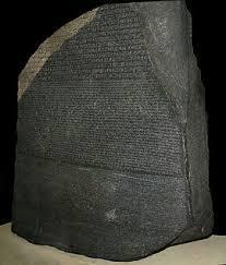 the rosetta stone- a stone with writing on it with two languages (Egyptian and Greek), using three scripts ( hieroglyphic, demotic, and G...