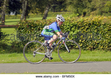 rides her bicycle