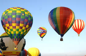 Why does a hot air balloon rise?