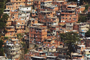 What are the advantages of global manufacturing for developing countries?