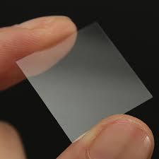 to cover objects placed on the microscope slide, keeping solid specimen pressed flat, and liquid samples shaped into a flat layer