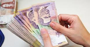 DEVALUACION DEL PESO FRENTE AL DOLAR Y SU IMPACTO ECONOMICO COLOMBIANO